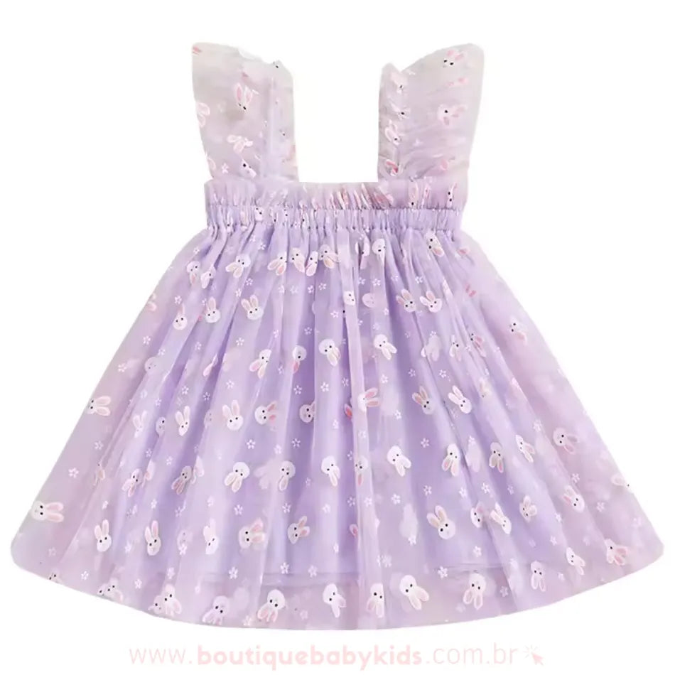Vestido infantil lilás com tule estampado de coelhinhos e detalhes florais, modelo fofo e ideal para ocasiões especiais. #lilas