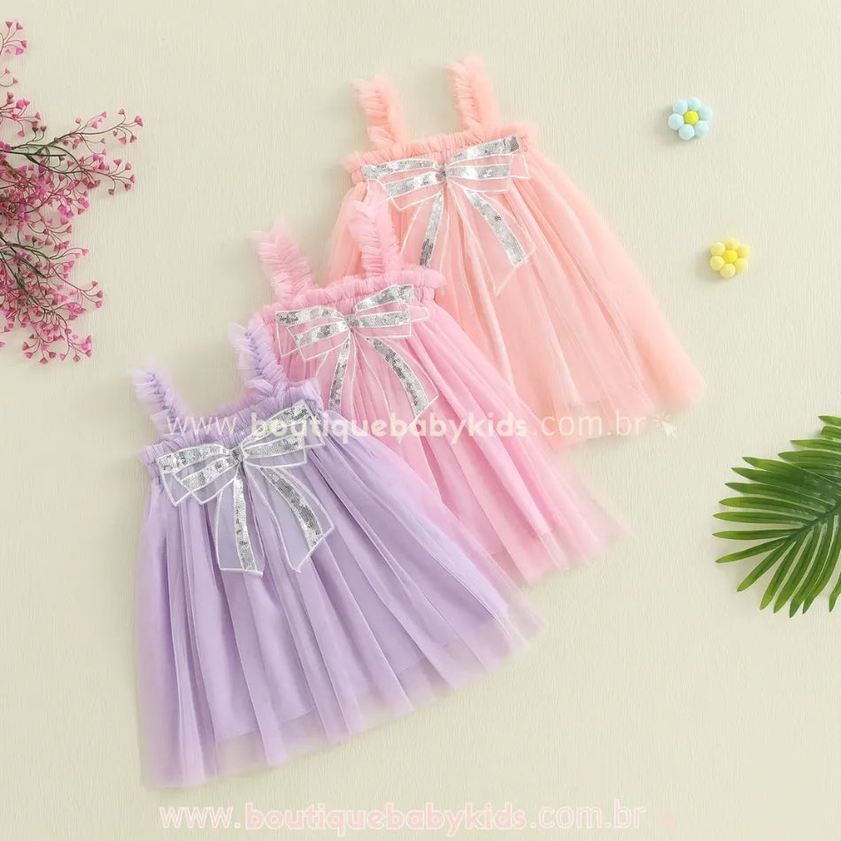 Trio de Vestidos Infantis Tule Laço de Paetês nas cores lilás, rosa e salmão com laço brilhante, da Boutique Baby Kids.