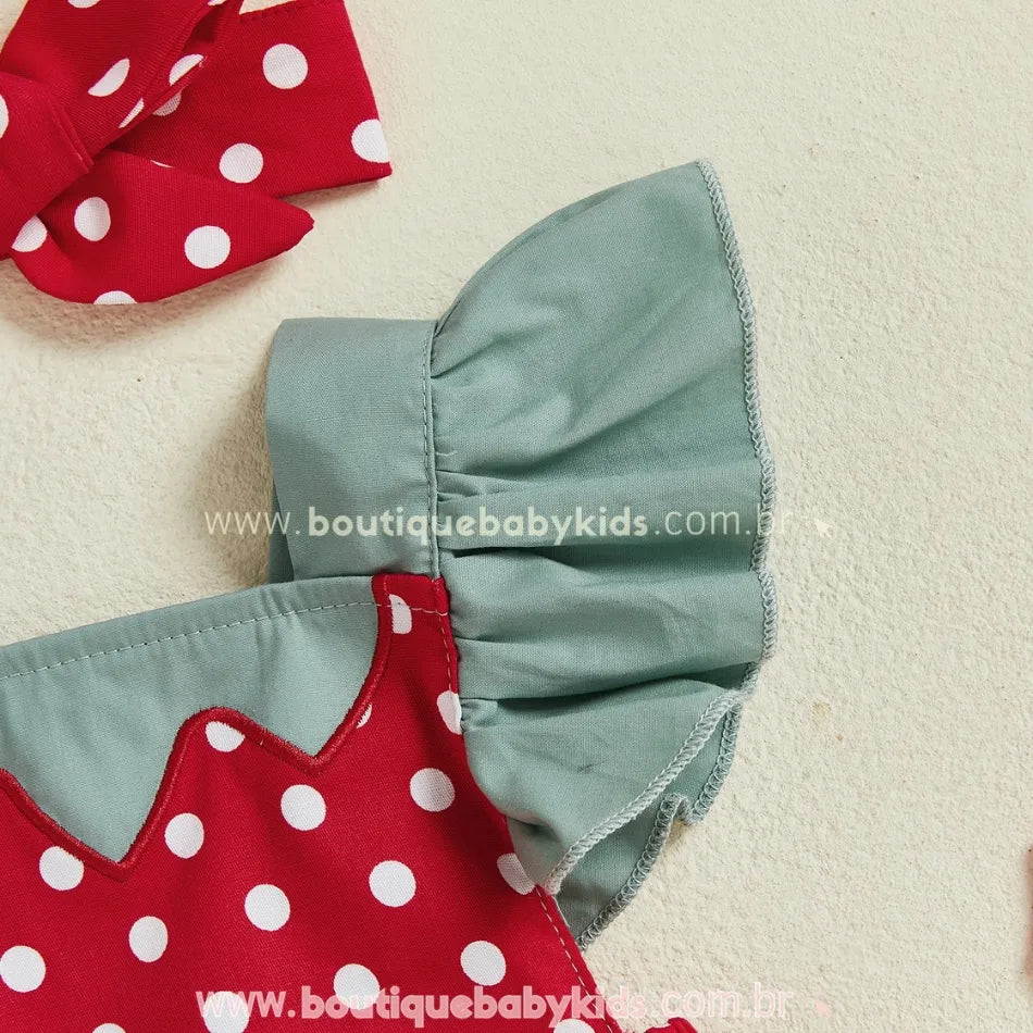 Manga babado verde em tecido estruturado, com acabamento delicado do romper temático